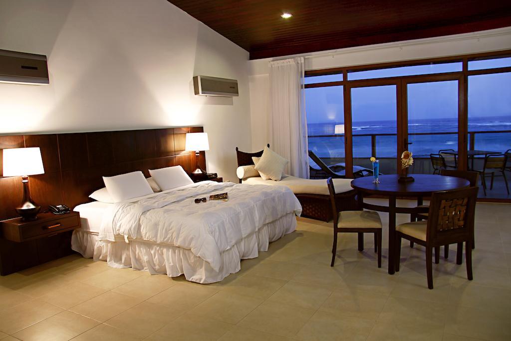 Iguana Crossing Boutique Hotel بْوُرتو فيلاميل الغرفة الصورة