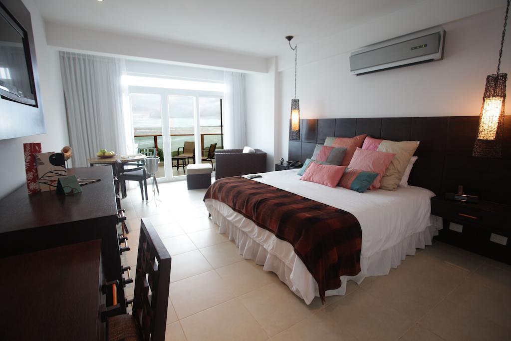 Iguana Crossing Boutique Hotel بْوُرتو فيلاميل الغرفة الصورة