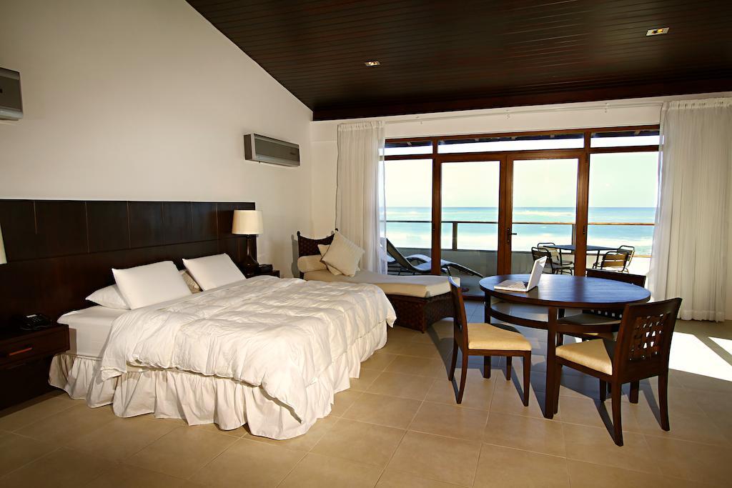 Iguana Crossing Boutique Hotel بْوُرتو فيلاميل الغرفة الصورة
