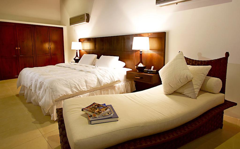 Iguana Crossing Boutique Hotel بْوُرتو فيلاميل الغرفة الصورة