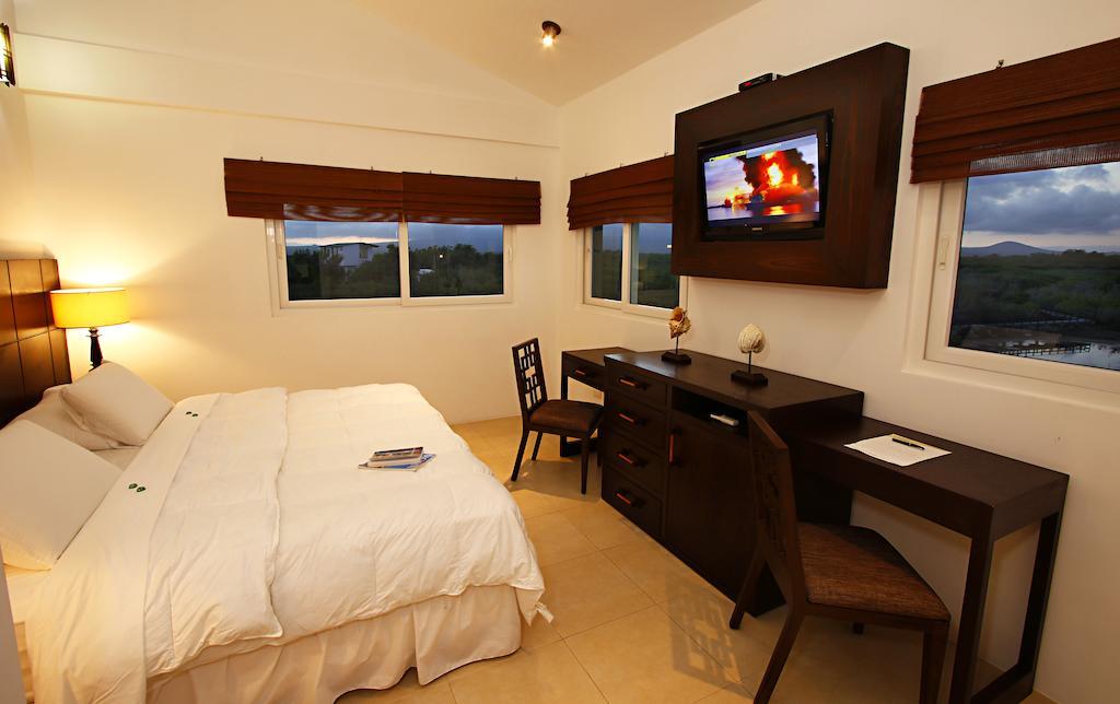 Iguana Crossing Boutique Hotel بْوُرتو فيلاميل الغرفة الصورة